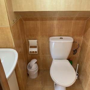 Toilet next to bedroom 5