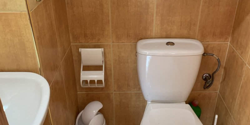 Toilet next to bedroom 5